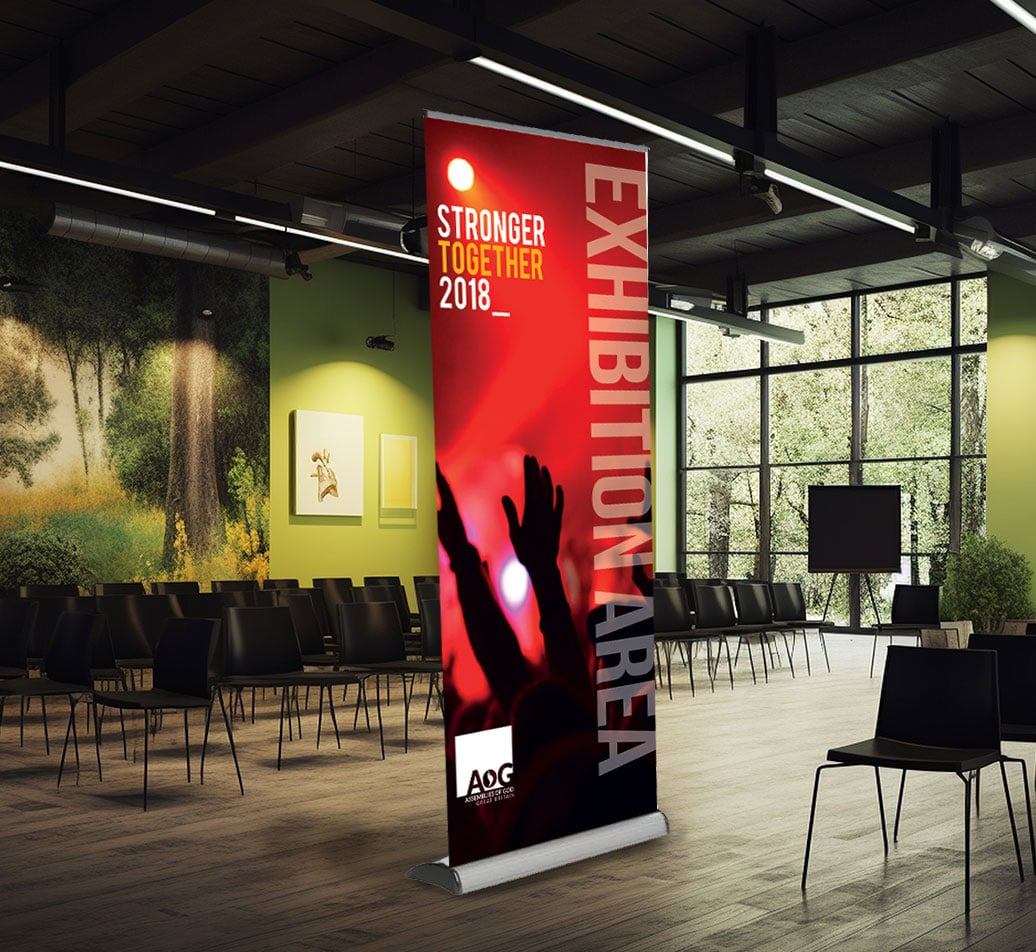 Cassette roller banner stand with interchangeable graphics system
