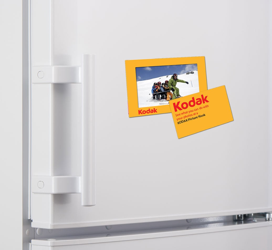 Custom printed magnetic photo frame featuring a standard photo holder on the outside, while the inner section pulls out as a separate magnet